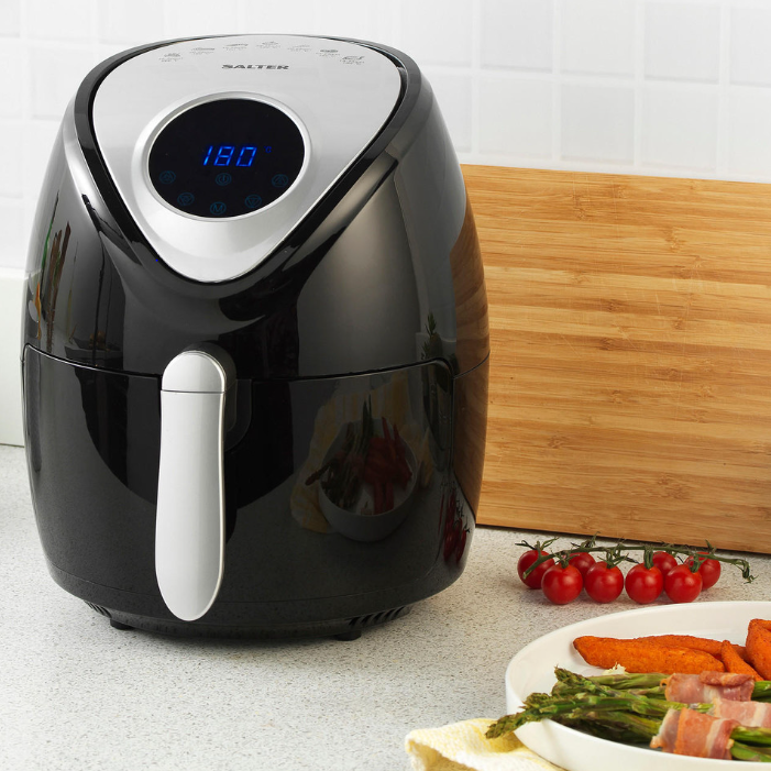 A Salter Digital Hot Air Fryer with some on the vine tomatoes 